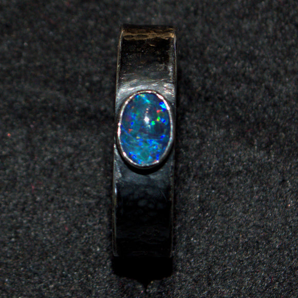 Opal and silver cast ring