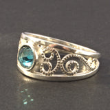 Topaz and silver openwork ring