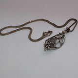 vintage silver abstract leaf pendant