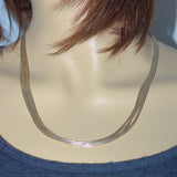 multi strand liquid silver necklace