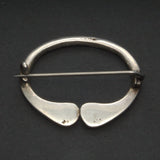 Celtic silver penannular brooch reverse view