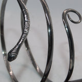 coiled snake silver bangle