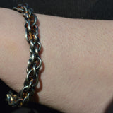 silver woven Viking style bangle on wrist