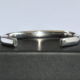 sterling torque bangle on gift box